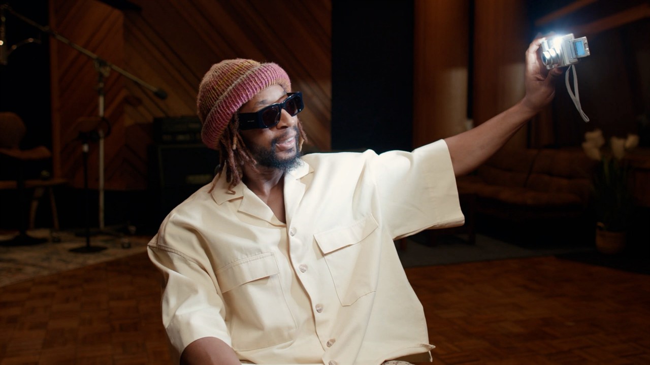 Man taking a selfie with a digital camera